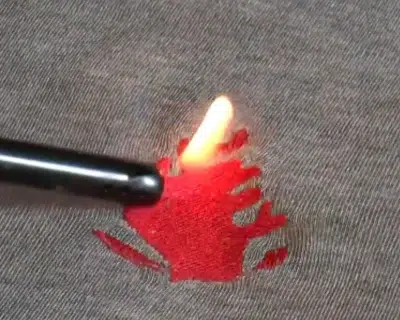 Fire resistant embroidery thread tested with flame on stitched fabric