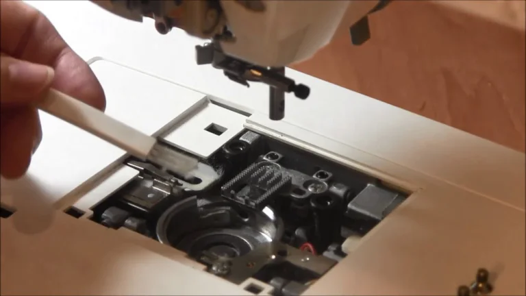 Cleaning embroidery machine bobbin area