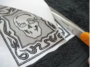 Removing stabilizer from finished embroidery design