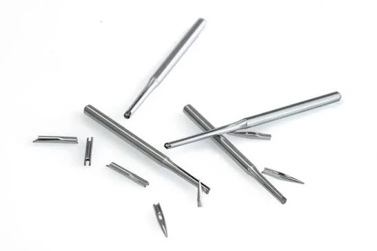 Damaged embroidery needles showing bends, snapped shafts, and broken tips Damaged embroidery needles showing bends, snapped shafts, and broken tips